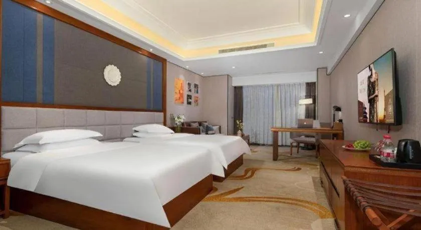 Bed in Metropolo Hotel Chengdu Wuhou Wanda Plaza