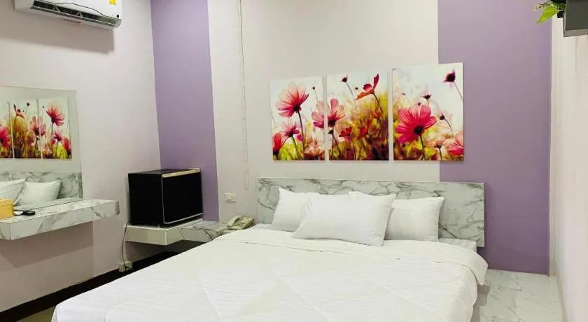 Bed in Sweet Hug Hotel