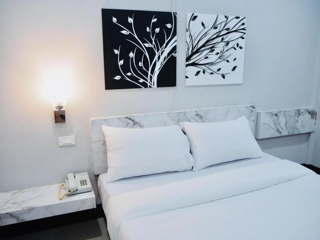 Bed in Sweet Hug Hotel