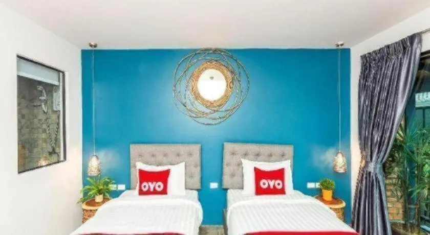 Bed in OYO 422 Jane Homestay and Resort