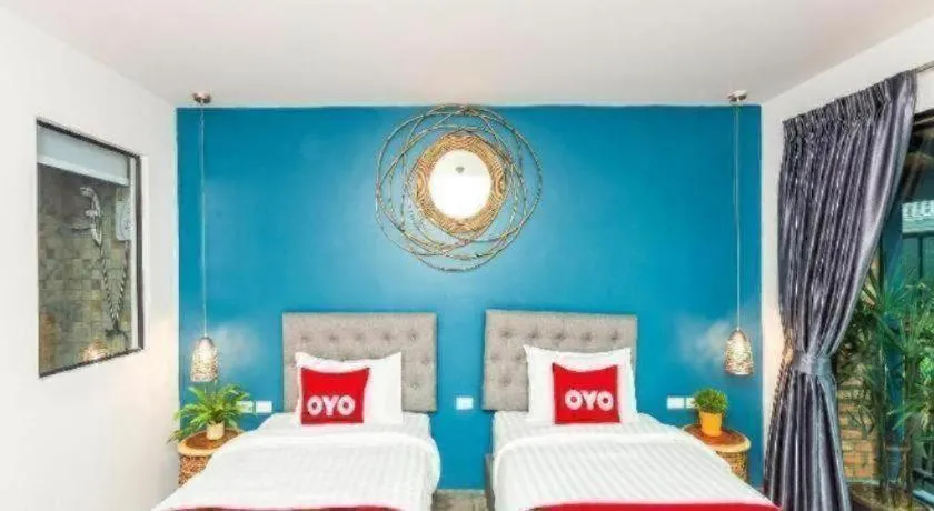 Bed in OYO 422 Jane Homestay and Resort