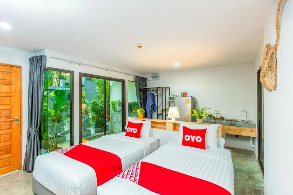 Bed in OYO 422 Jane Homestay and Resort