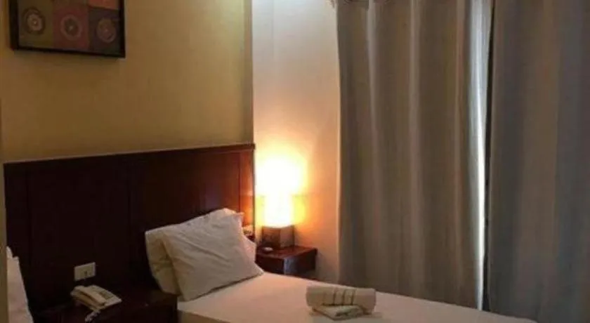 Bed in Alice in Wonderland Beach Hotel