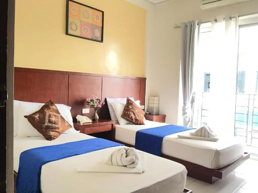 Bed in Alice in Wonderland Beach Hotel