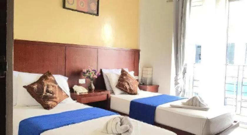 Bed in Alice in Wonderland Beach Hotel