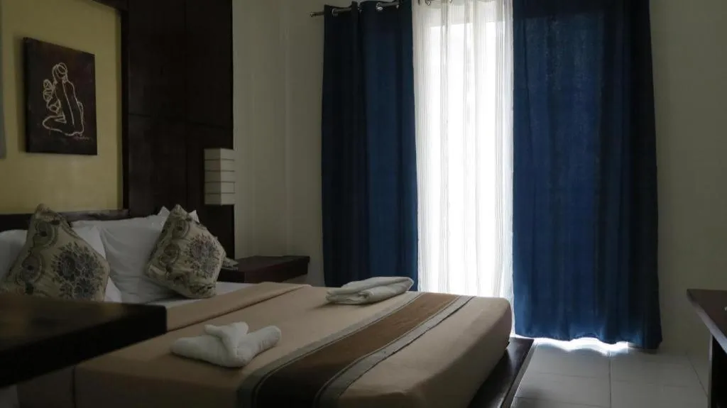 Bed in Alice in Wonderland Beach Hotel