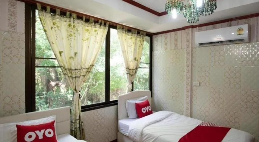 Bed in Raknatee Resort