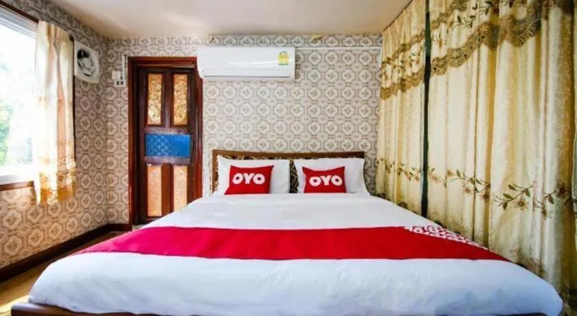 Bed in Raknatee Resort