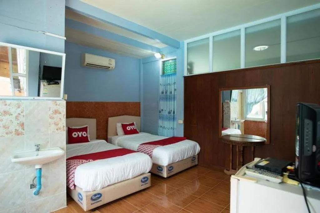 Bed in Raknatee Resort