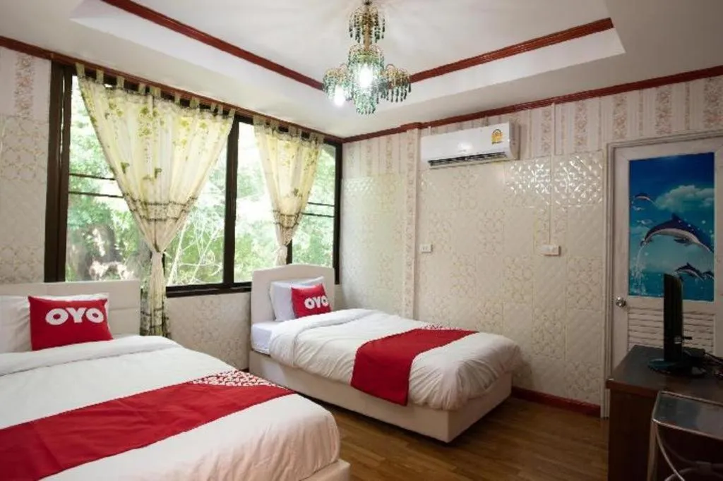 Bed in Raknatee Resort