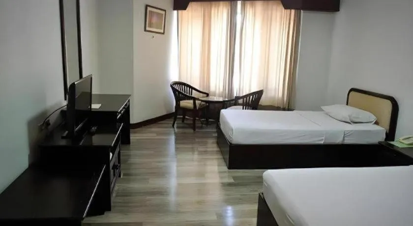 Bed in Royal Diamond Hotel