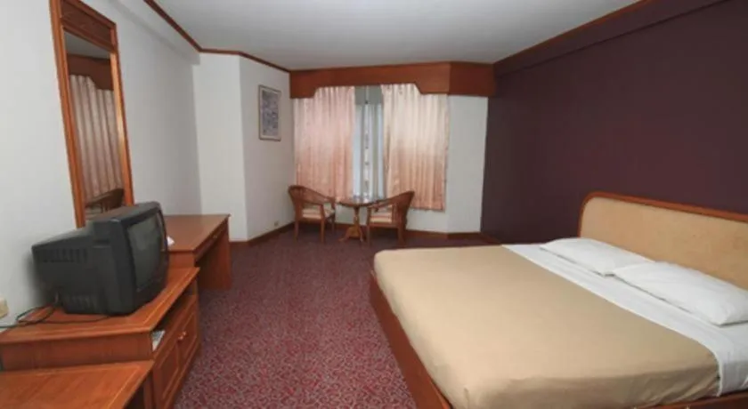 Bed in Royal Diamond Hotel