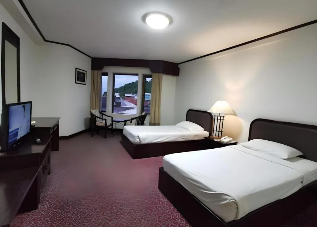 Bed in Royal Diamond Hotel