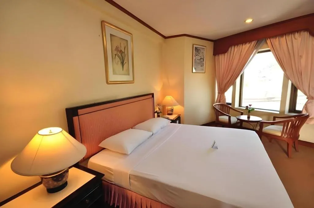 Bed in Royal Diamond Hotel