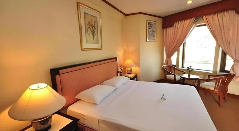 Bed in Royal Diamond Hotel