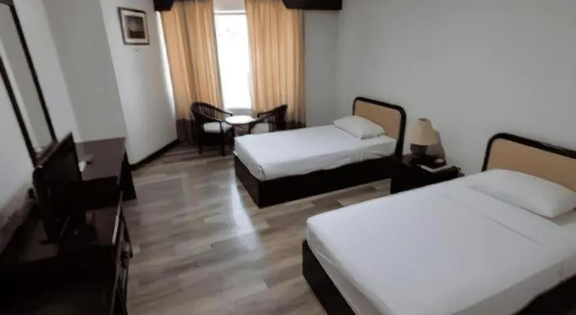 Bed in Royal Diamond Hotel