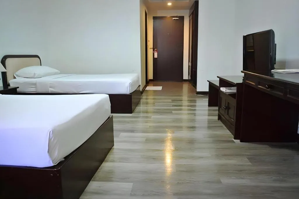 Bed in Royal Diamond Hotel