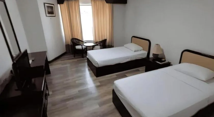 Bed in Royal Diamond Hotel