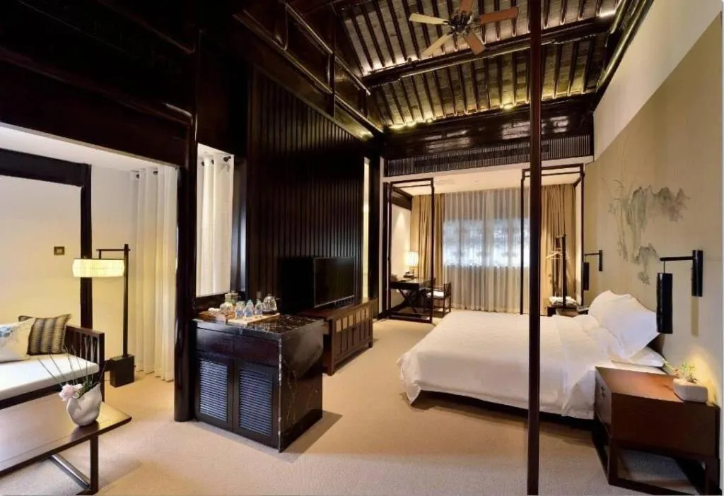 Bed in Blossom Hill Inn Suzhou Tanhuafu