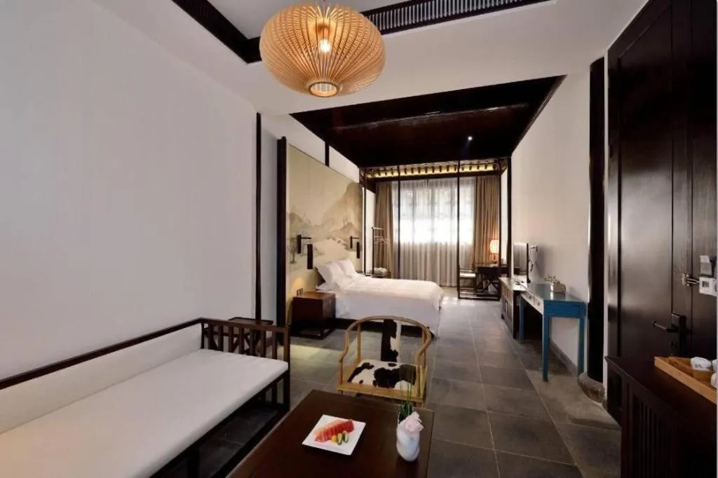 Bed in Blossom Hill Inn Suzhou Tanhuafu