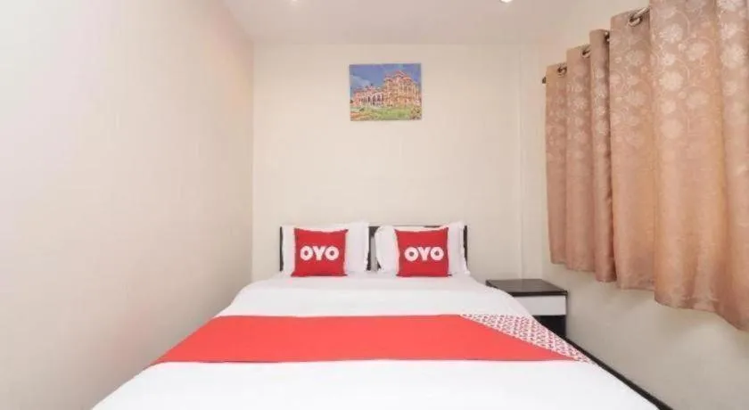 Bed in OYO 253 KK 11 Boutique Inn