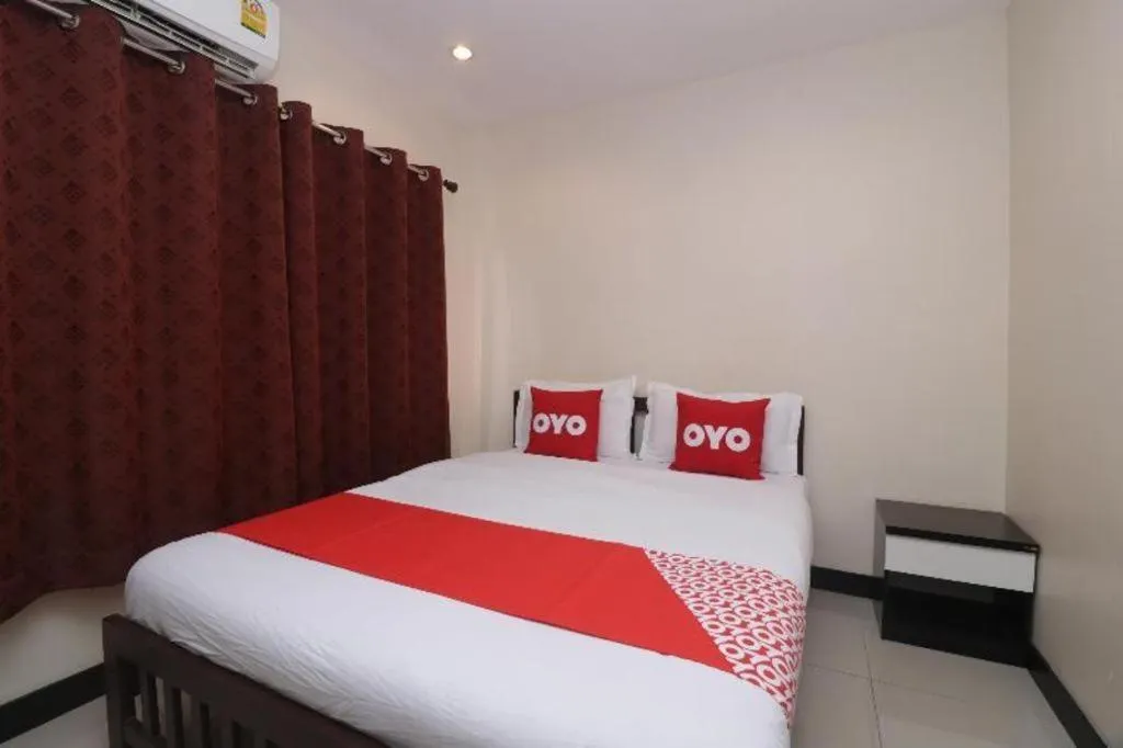 Bed in OYO 253 KK 11 Boutique Inn