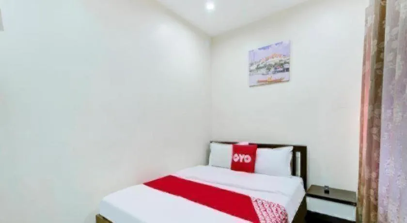 Bed in OYO 253 KK 11 Boutique Inn