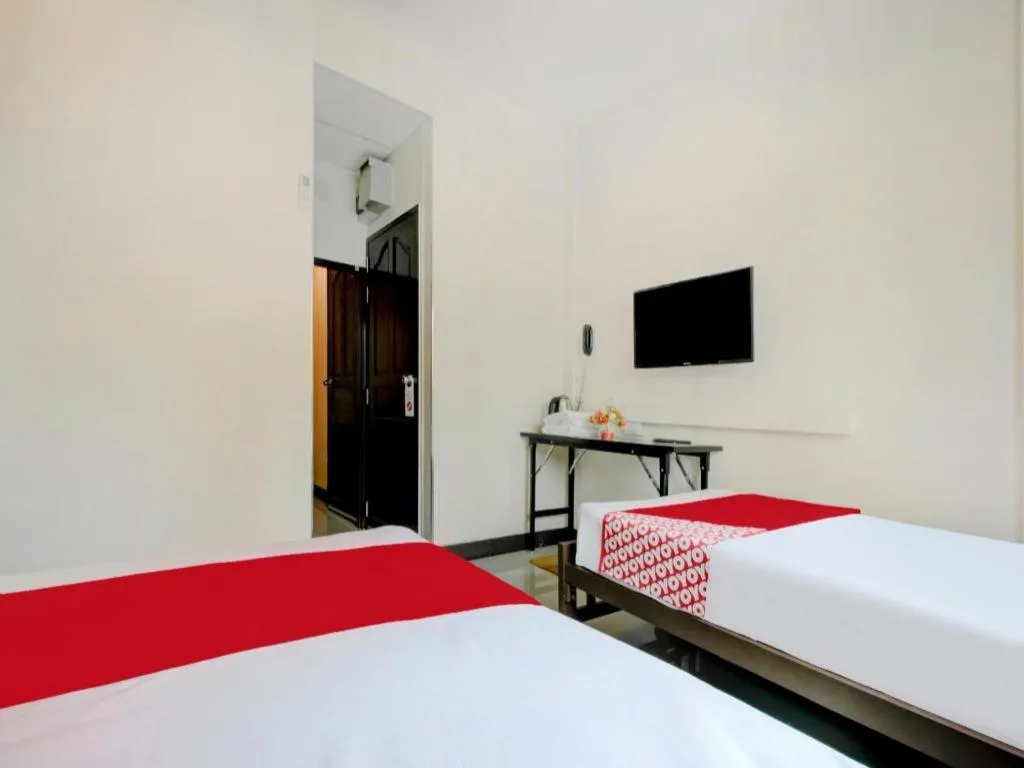 Bed in OYO 253 KK 11 Boutique Inn