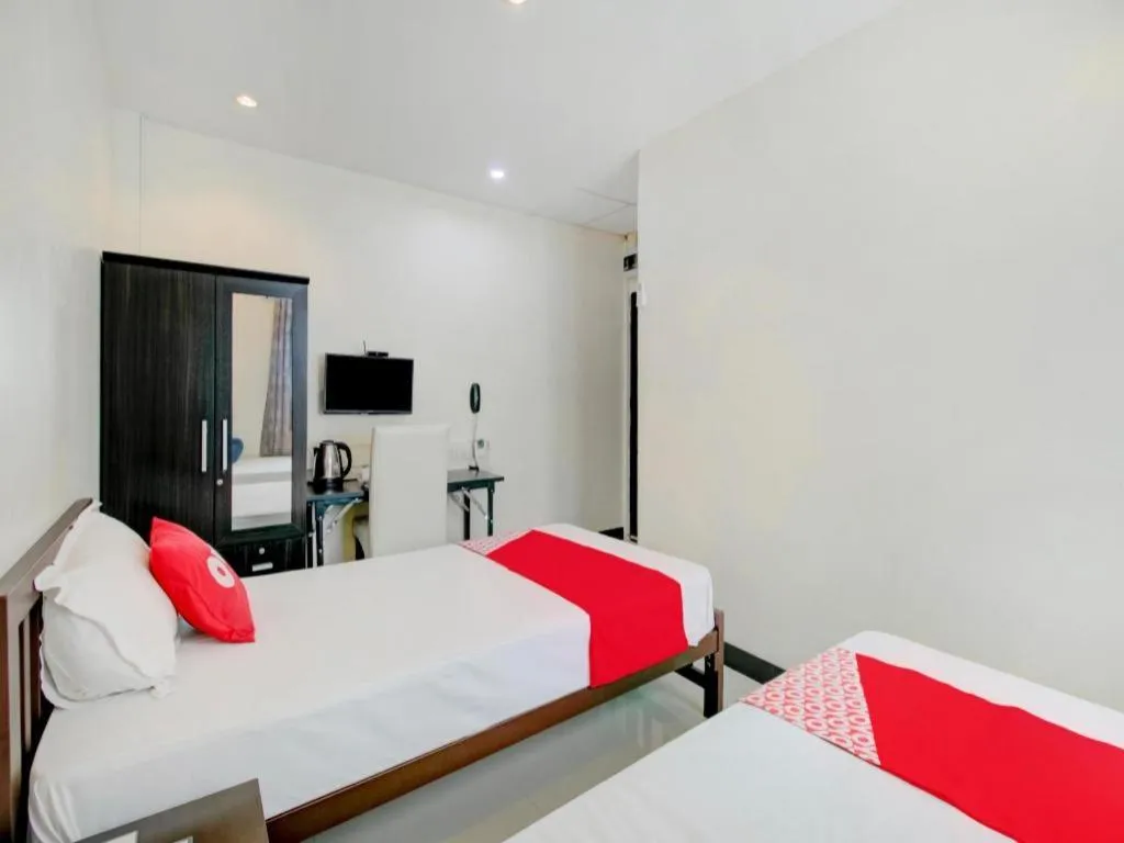 Bed in OYO 253 KK 11 Boutique Inn