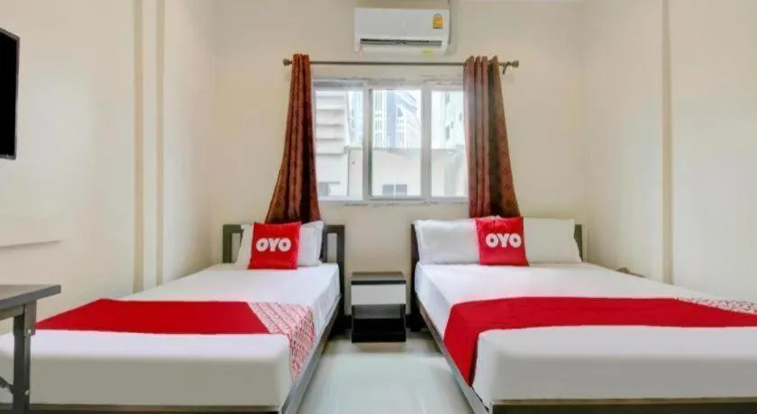 Bed in OYO 253 KK 11 Boutique Inn