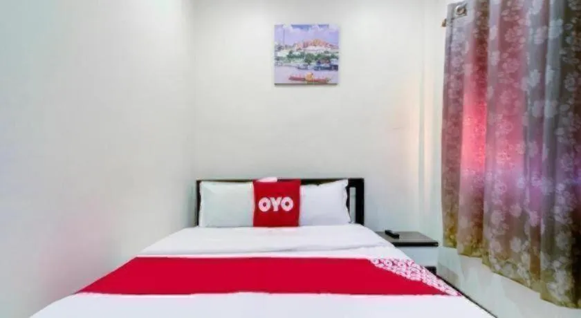 Bed in OYO 253 KK 11 Boutique Inn
