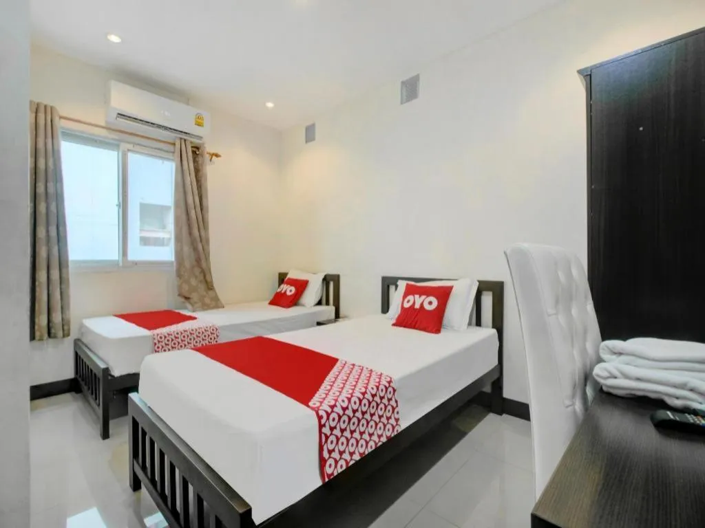 Bed in OYO 253 KK 11 Boutique Inn
