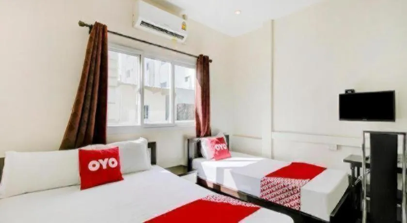Bed in OYO 253 KK 11 Boutique Inn