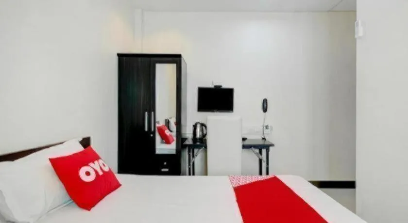 Bed in OYO 253 KK 11 Boutique Inn