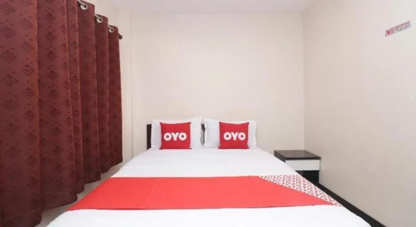 Bed in OYO 253 KK 11 Boutique Inn