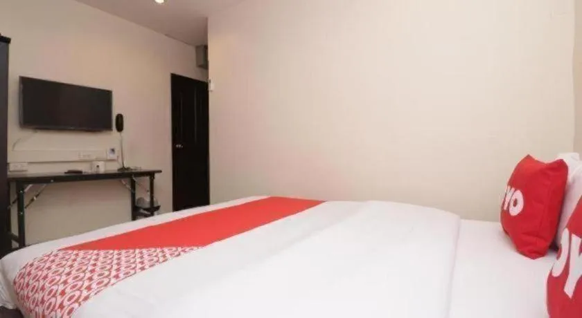 Bed in OYO 253 KK 11 Boutique Inn