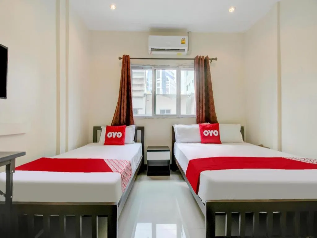 Bed in OYO 253 KK 11 Boutique Inn