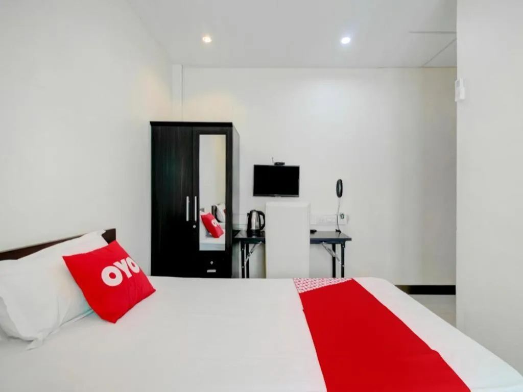 Bed in OYO 253 KK 11 Boutique Inn