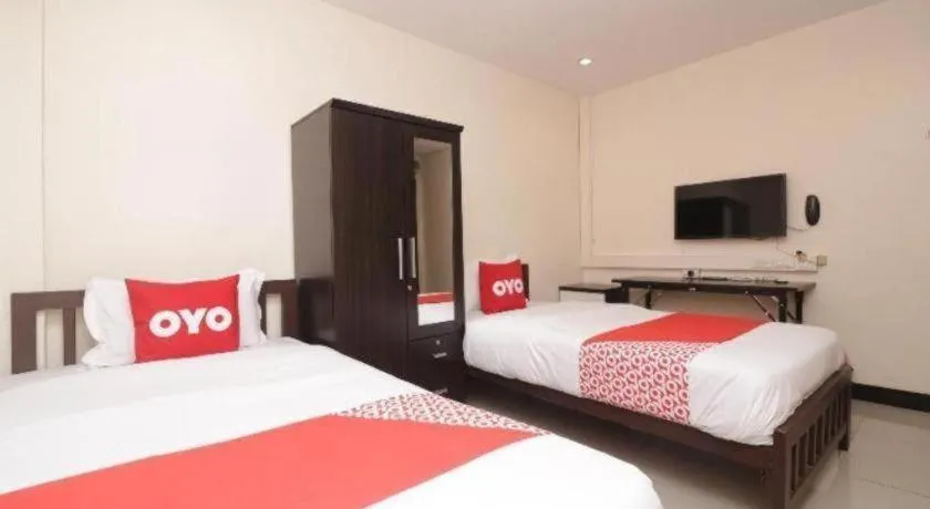 Bed in OYO 253 KK 11 Boutique Inn