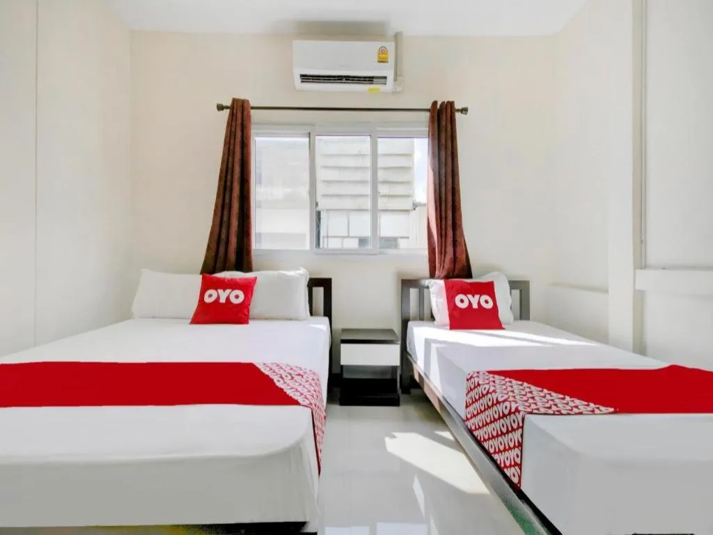 Bed in OYO 253 KK 11 Boutique Inn