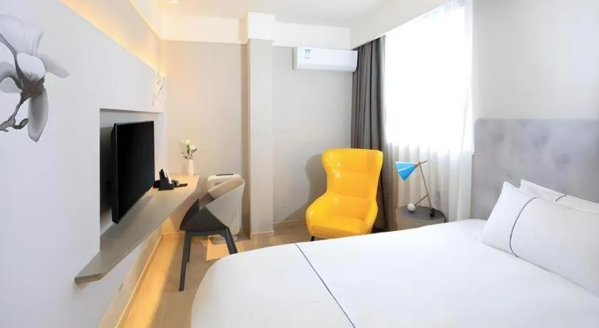 Bed in Magnotel Hotel·Shanghai Xintiandi