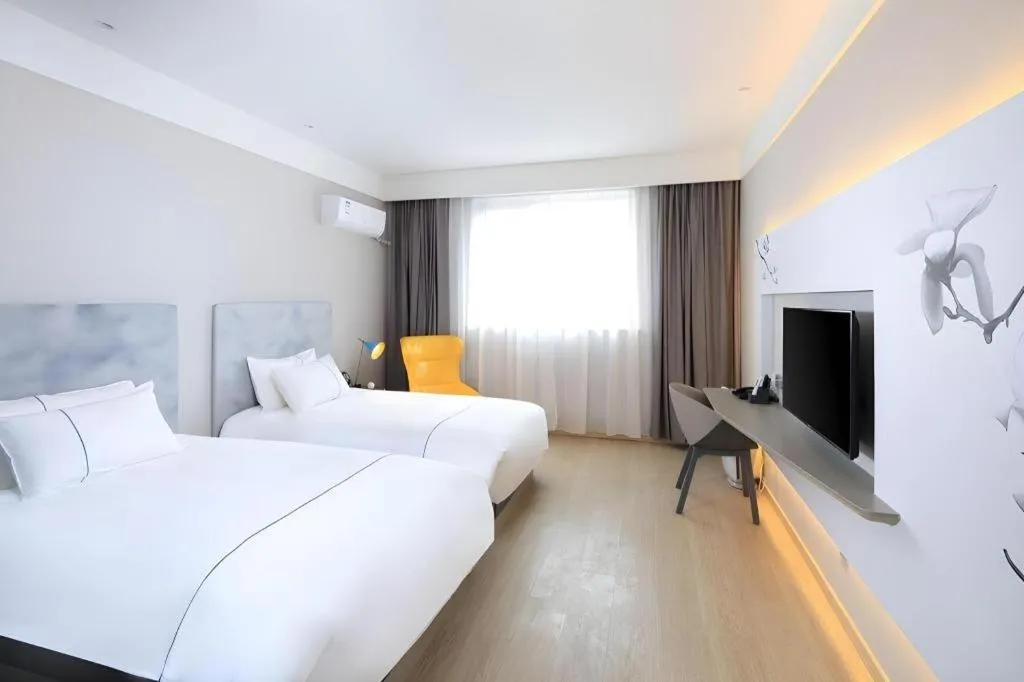 Bed in Magnotel Hotel·Shanghai Xintiandi