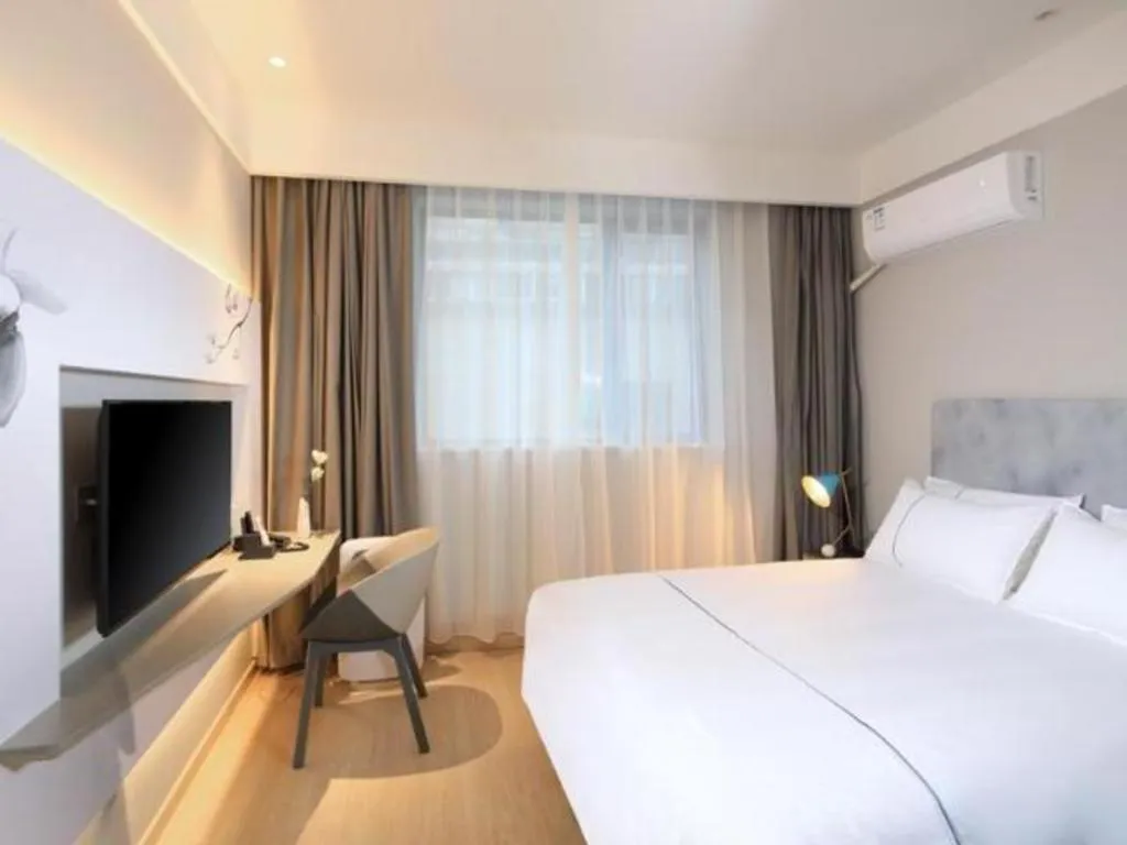 Bed in Magnotel Hotel·Shanghai Xintiandi