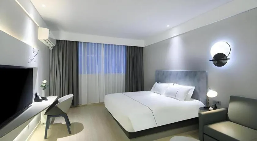 Bed in Magnotel Hotel·Shanghai Xintiandi