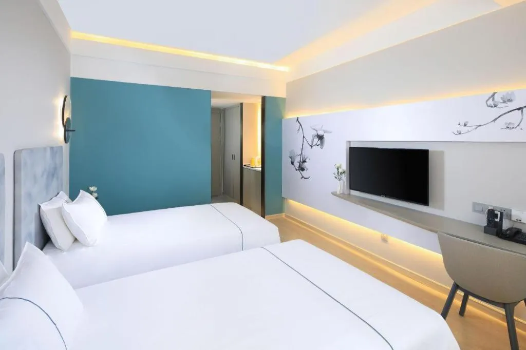 Bed in Magnotel Hotel·Shanghai Xintiandi