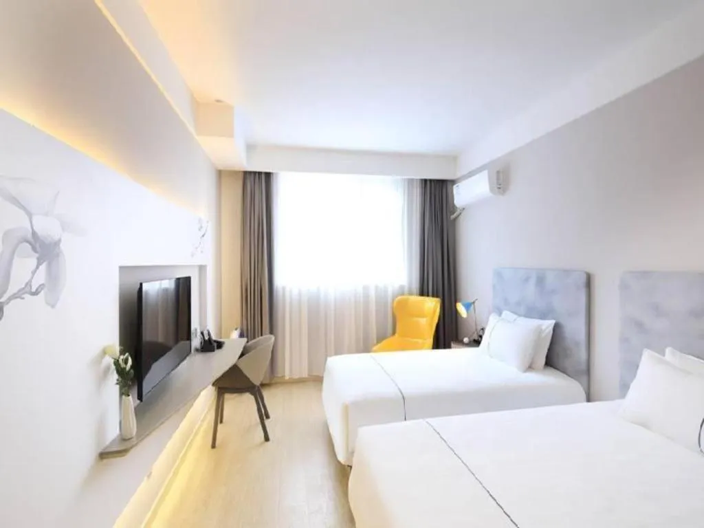 Bed in Magnotel Hotel·Shanghai Xintiandi