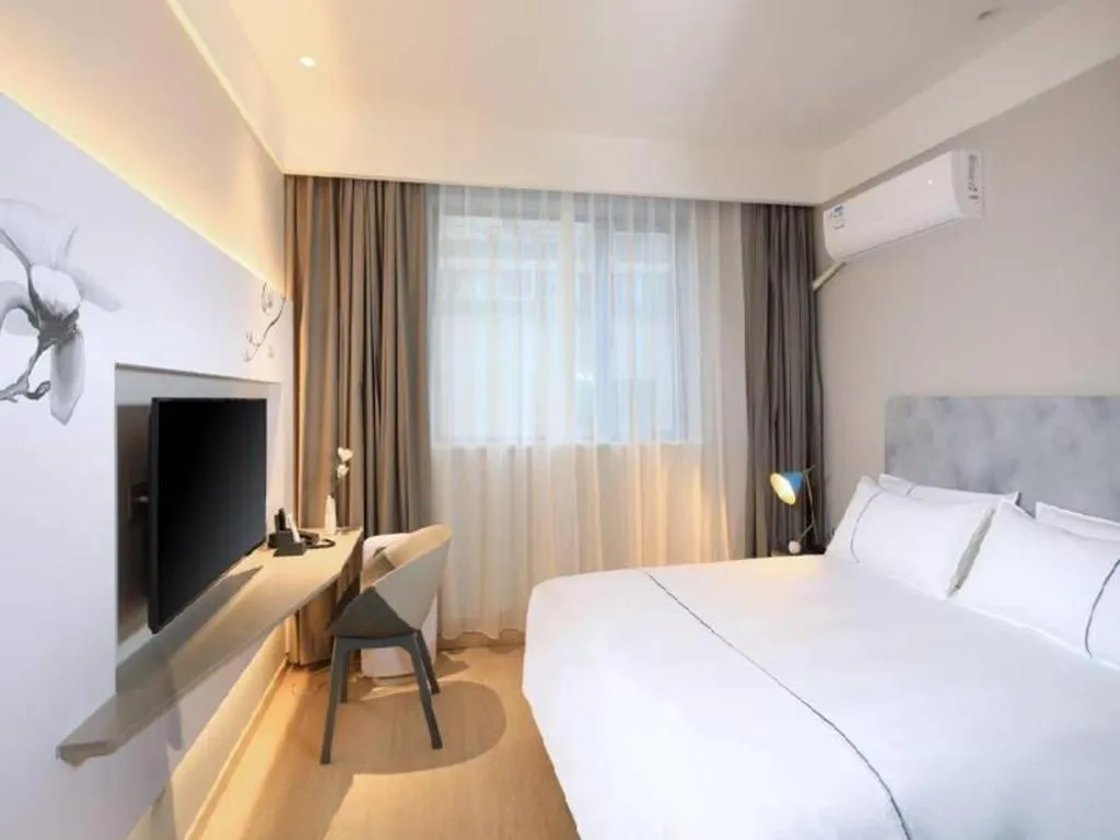 Bed in Magnotel Hotel·Shanghai Xintiandi