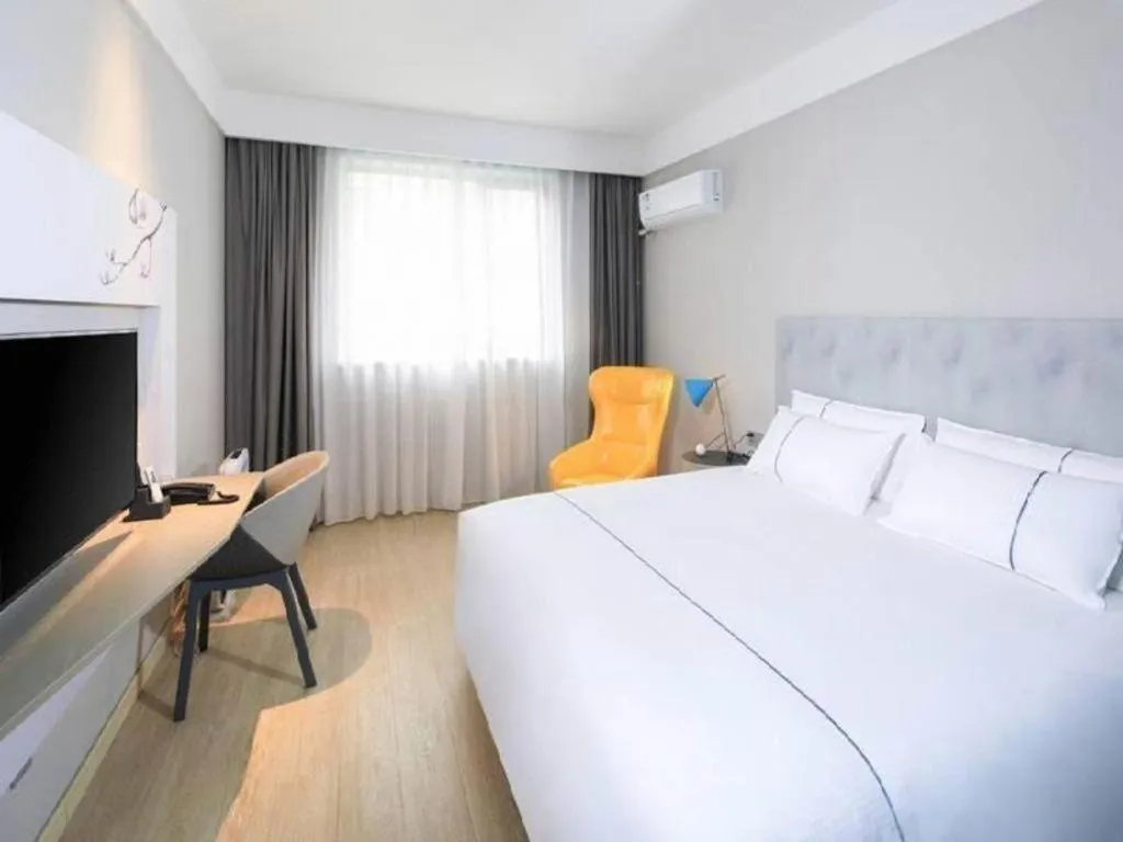 Bed in Magnotel Hotel·Shanghai Xintiandi