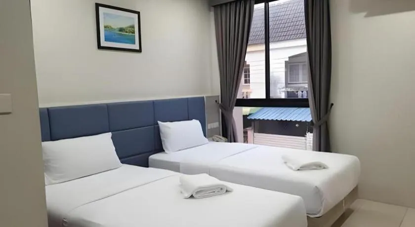 Bed in Sattahip 9 Boutique Hotel