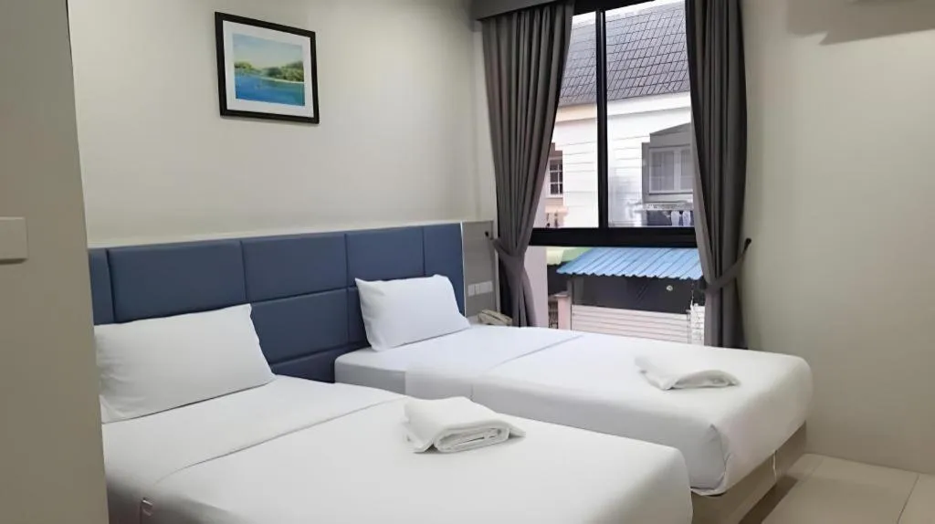 Bed in Sattahip 9 Boutique Hotel